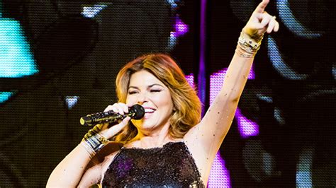 Shania Twain is opening up about her reasons for posing topless. In an interview with Extra published Friday, the singer, 57, got candid about feeling insecure about her body growing up and how ...